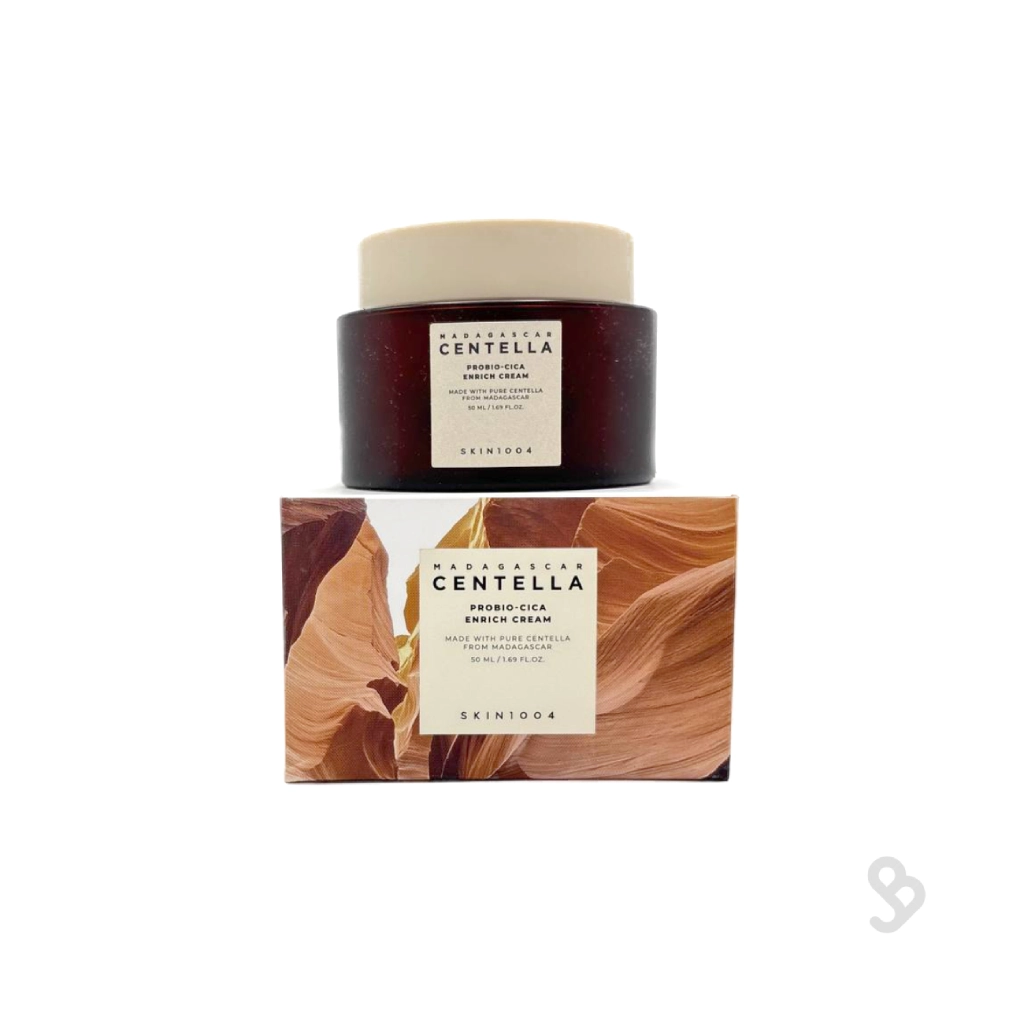 skin1004-probio-cica-enrich-cream-jar خرید کرم پروبیو سیکا اسکین 1004 با بسته بندی قهوه ای و قطره چکان روی سنگ طبیعی